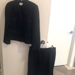 Neuman Marcus exclusive suit with satin trim and peplum on jacket